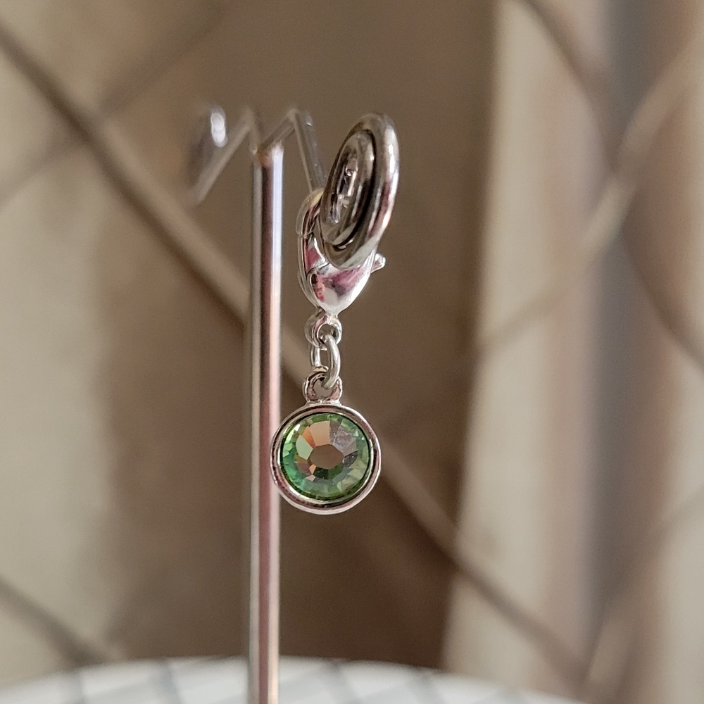 EUC- Touchstone Crystal by Swarovski Green Crystal Charm